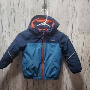 Patagonia kids 4T jacket with noticeable damage at the collar/zip area.